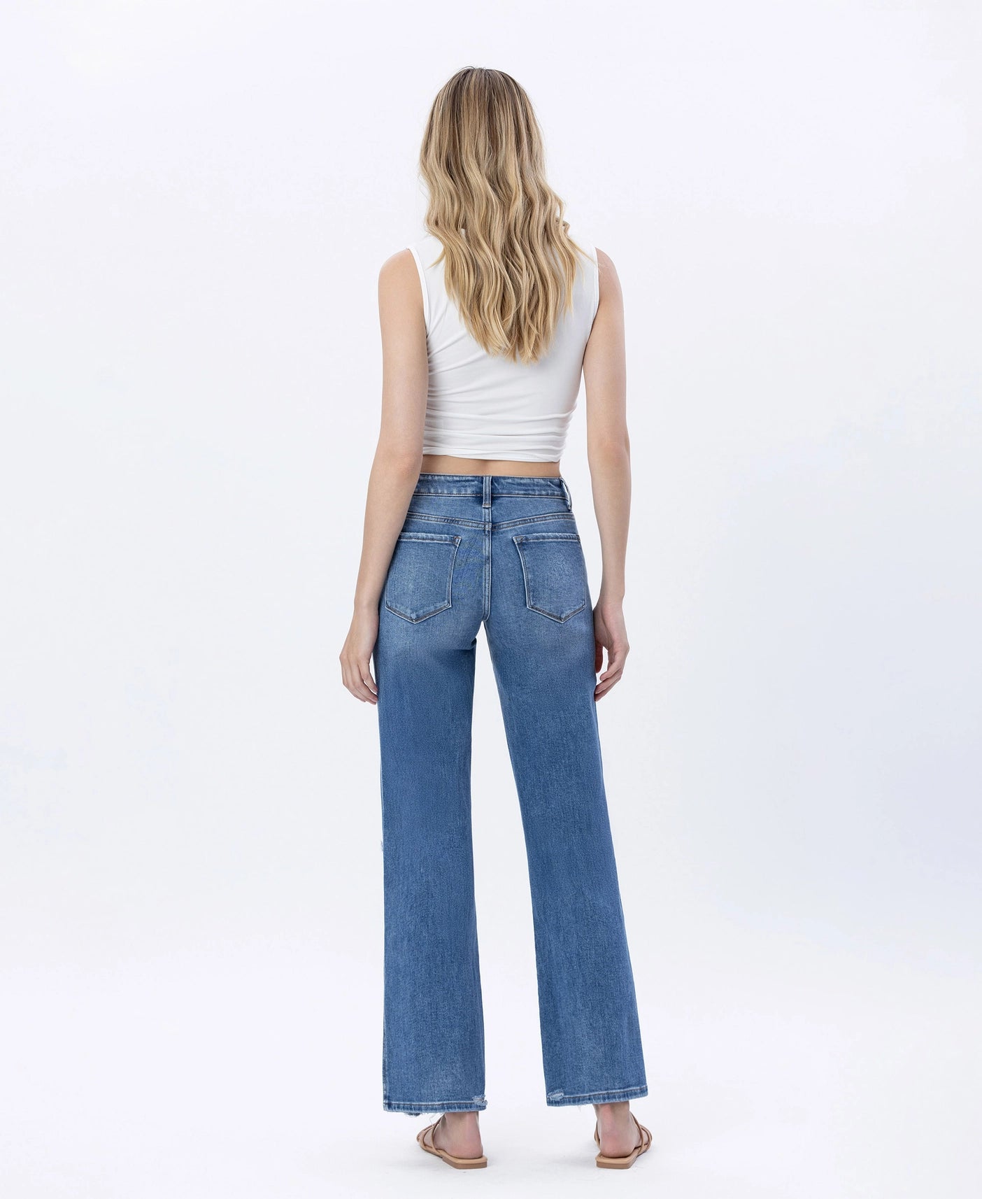 Gladden Slim Wide Jeans — high rise distressed slim wide leg jeans with full length fit and comfort stretch.