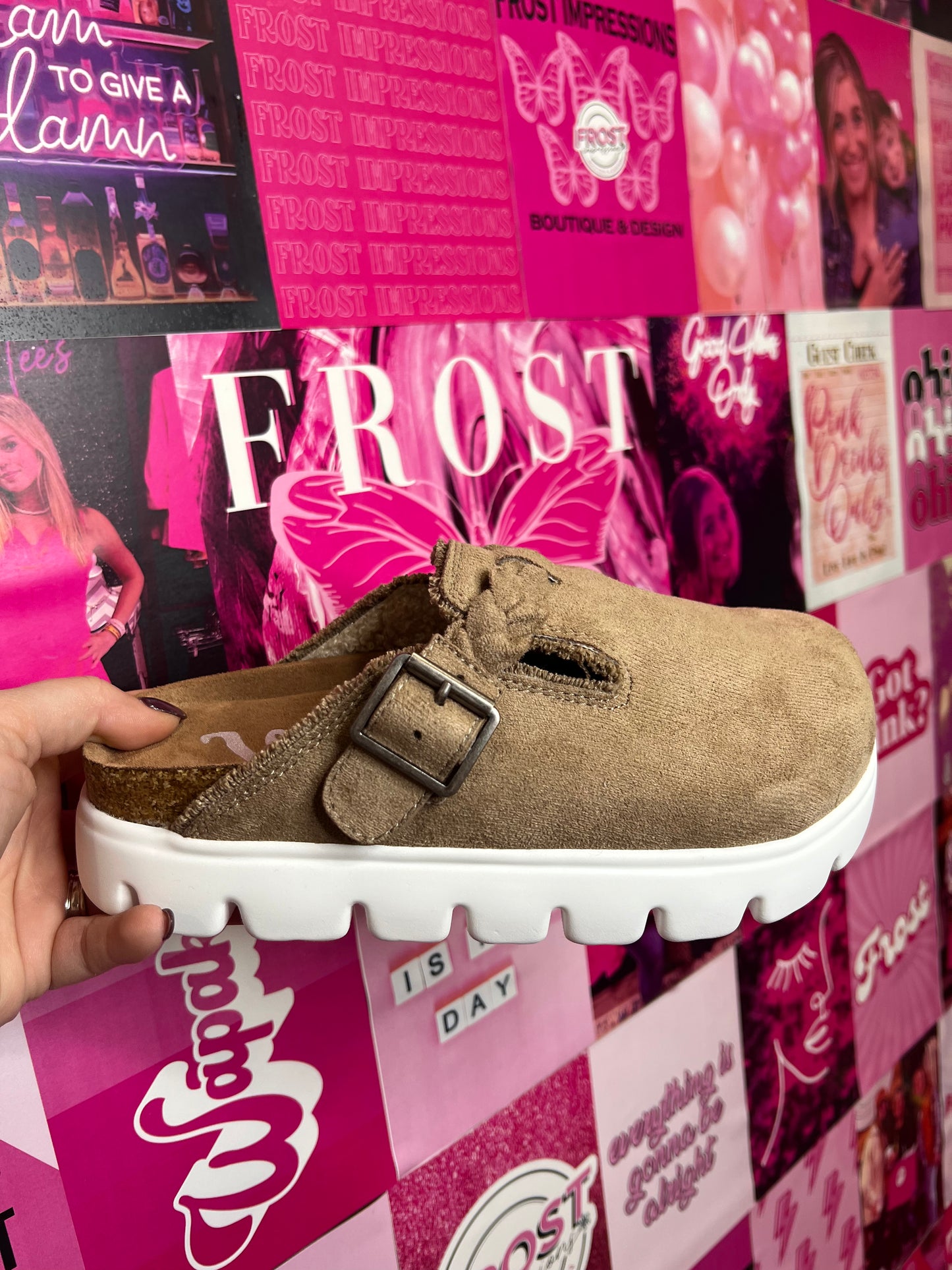 Brown faux suede slip-on platform mules with sherpa lining and buckle detail — Cali Platform Mules from Frost Impressions Boutique in Wapakoneta, Ohio.