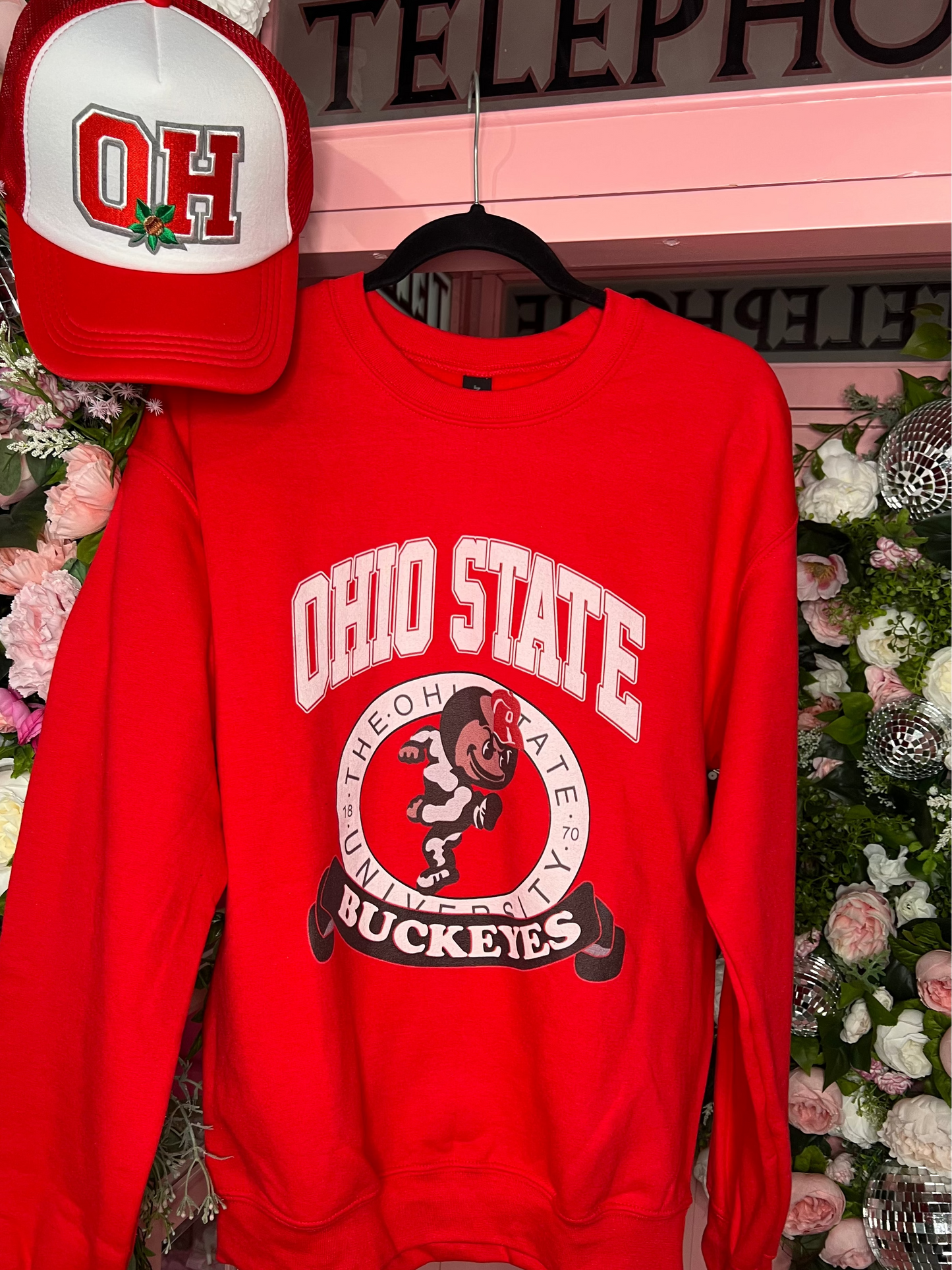 Vintage-inspired OSU sweatshirt in soft cotton — classic red and white collegiate design from Frost Impressions Boutique in Wapakoneta, Ohio.