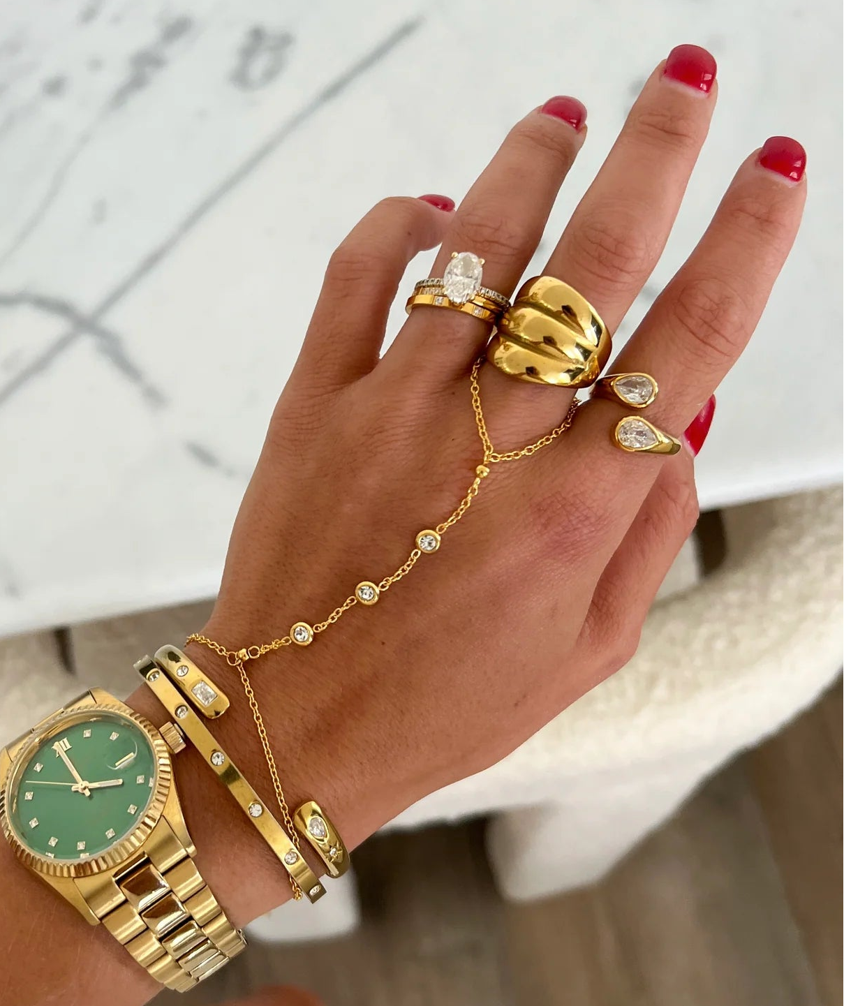 Luxe Hand Chain — 18k gold plated stainless steel water-resistant hand chain bracelet with ring attachment, available at Frost Impressions Boutique in Wapakoneta, Ohio.