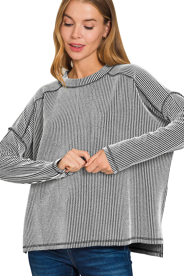 Black and white ribbed boat neck long sleeve top with raw edge finish β Contrast Ribbed Top from Frost Impressions Boutique.