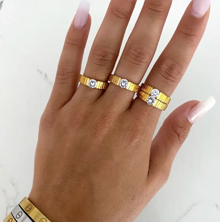 Dainty Diamond Ring β 18k gold plated stainless steel, water-resistant ring with a delicate diamond detail, available at Frost Impressions Boutique in Wapakoneta, Ohio.