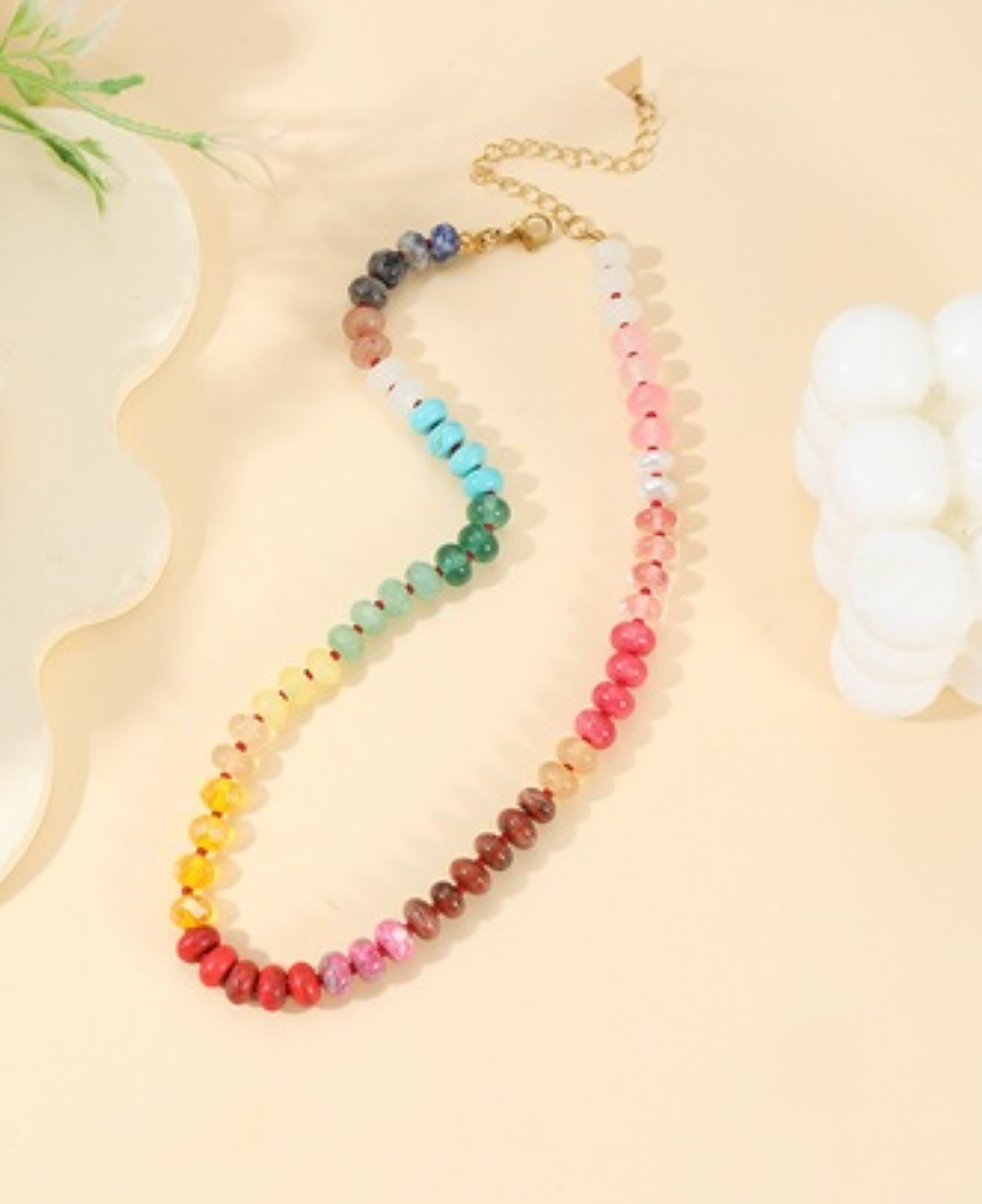 Colorful gemstone bead necklace in assorted mixes including blue, pastel, and bright multicolor styles