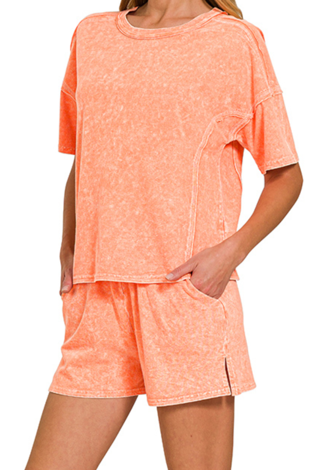 Acid wash lounge set with short sleeve tee and elastic waistband shorts in pink, mango, and violet color mixes