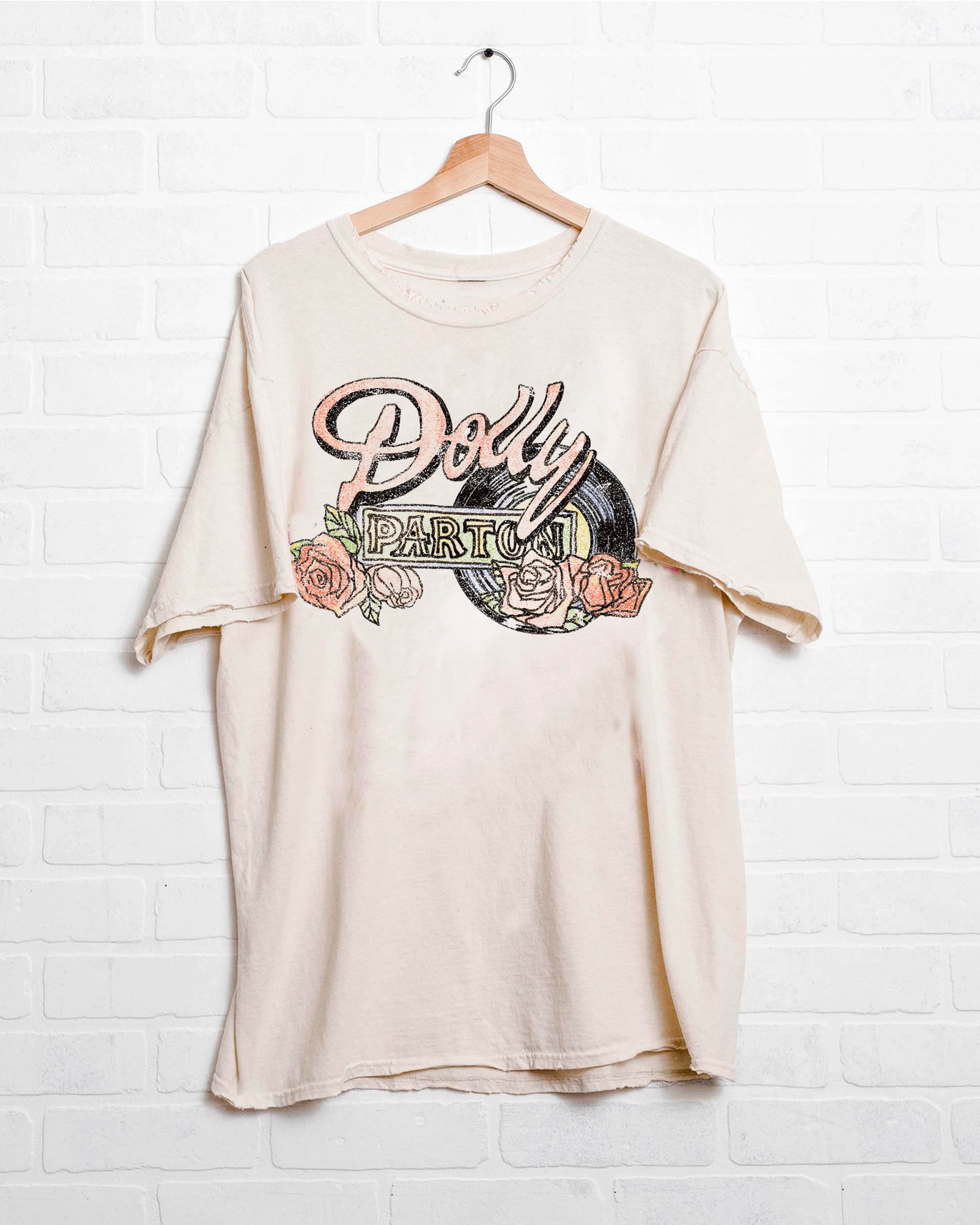 Dolly Parton vintage graphic tee — officially licensed distressed cotton t-shirt from Frost Impressions Boutique in Wapakoneta, Ohio.