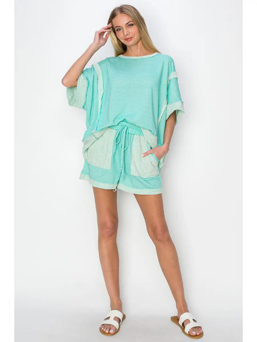 Mint French terry two-piece lounge set with rolled sleeve top and drawstring shorts