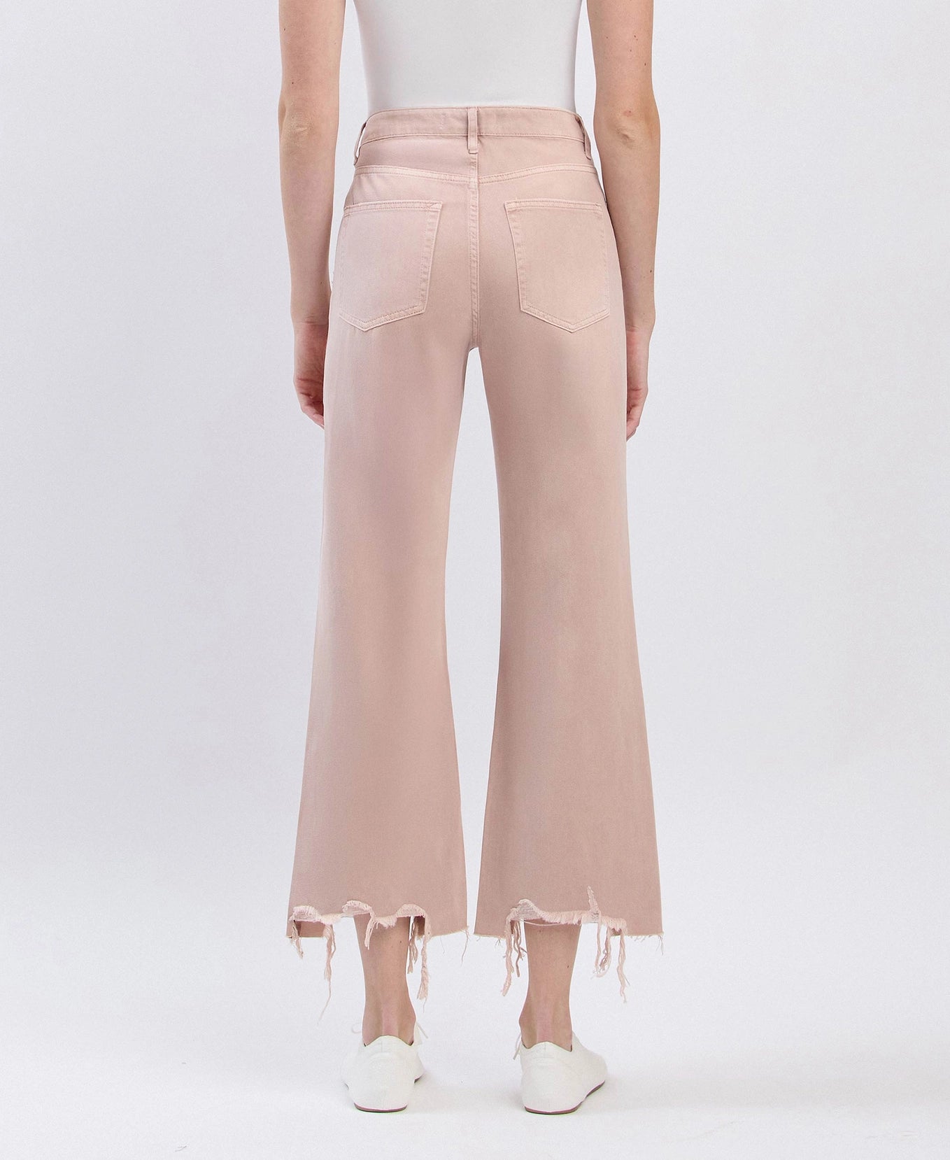 90s vintage inspired super high rise crop flare jeans with distressed detail and raw hem