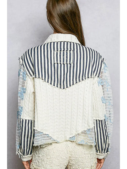 Blue patchwork long sleeve woven jacket with cable knit and lace floral details, button front, and relaxed fit