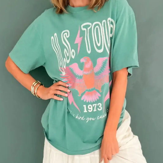 Green washed Comfort Colors graphic tee with U.S. tour design in a relaxed fit