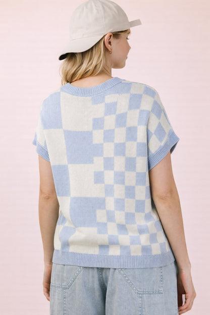 Sky blue multi-color knit top with checkered pattern and soft textured fabric