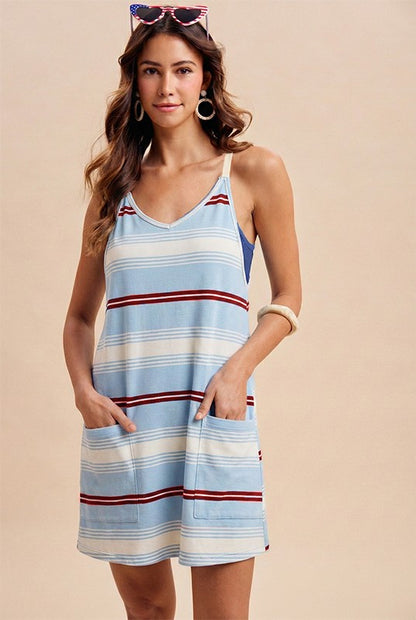 Multi stripe terry active romper dress with deep V neckline, pocket detail, and relaxed fit