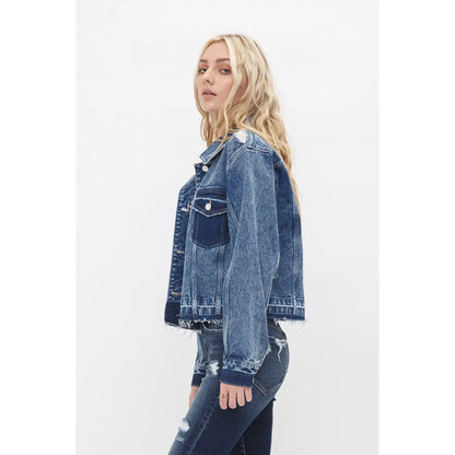 Boyfriend style cropped denim jacket with undone hem, relaxed fit, and classic button front