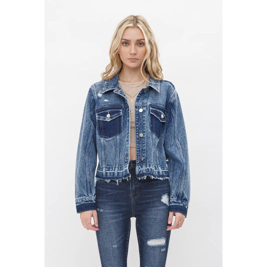 Boyfriend style cropped denim jacket with undone hem, relaxed fit, and classic button front