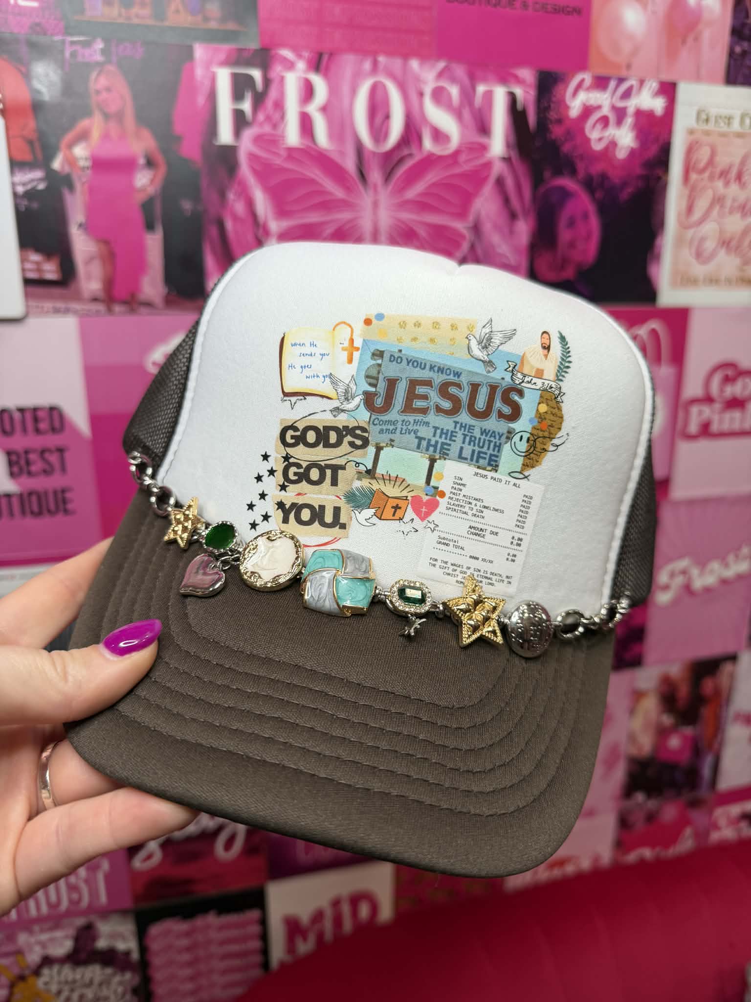 Trucker hat with “God’s Got You” graphic and mesh back in a faith-inspired casual style