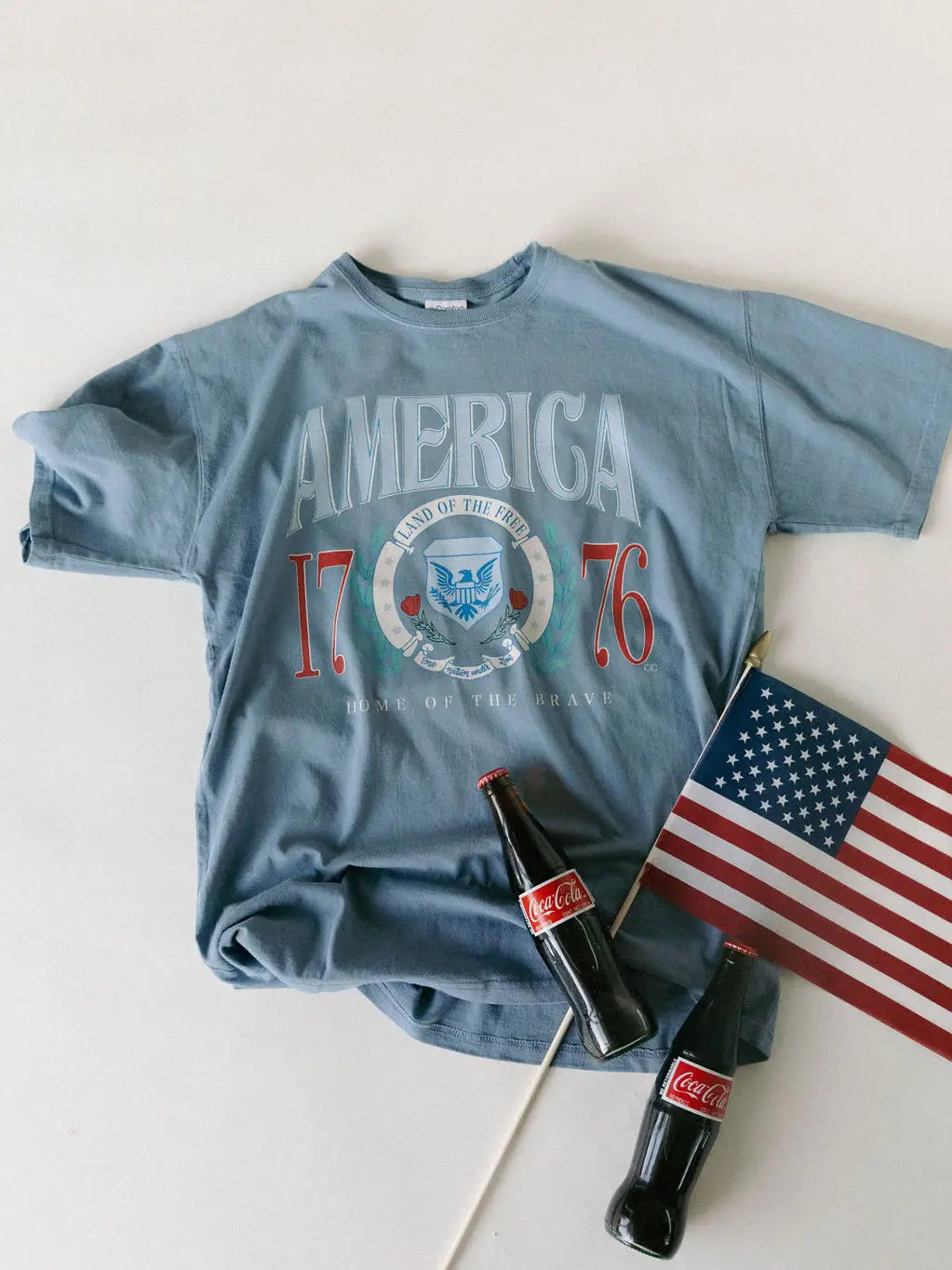 Denim Comfort Wash graphic tee with vintage America 1776 design and relaxed unisex fit