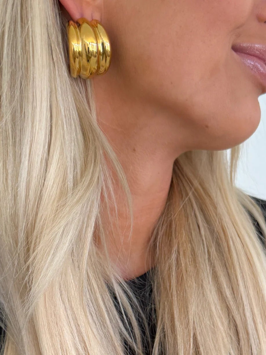 Bella Hoops (Gold) — 18k gold plated stainless steel water-resistant lightweight hoop earrings with lifetime warranty, available at Frost Impressions Boutique in Wapakoneta, Ohio.