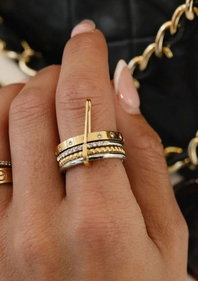 Charlie Ring — 18k gold plated stainless steel water-resistant minimalist ring with lifetime warranty, available at Frost Impressions Boutique in Wapakoneta, Ohio.