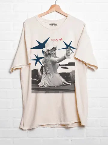 Off white distressed Dolly Parton patriotic graphic tee with vintage style and relaxed fit