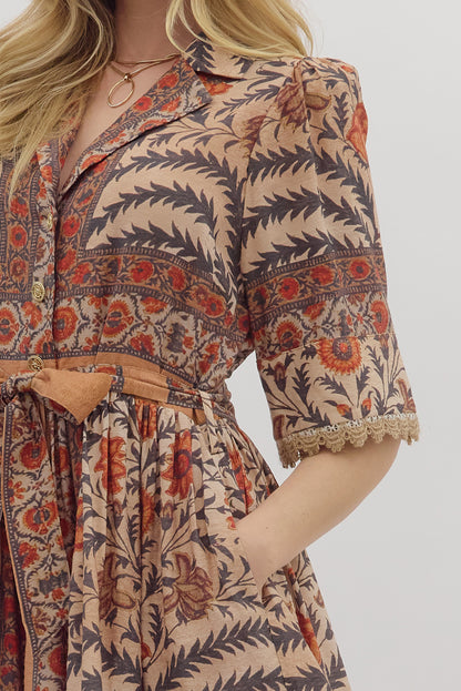 Bolter Mini Dress with botanical floral print, puff sleeves, lace trim, button front, removable belt, and elastic back waist.
