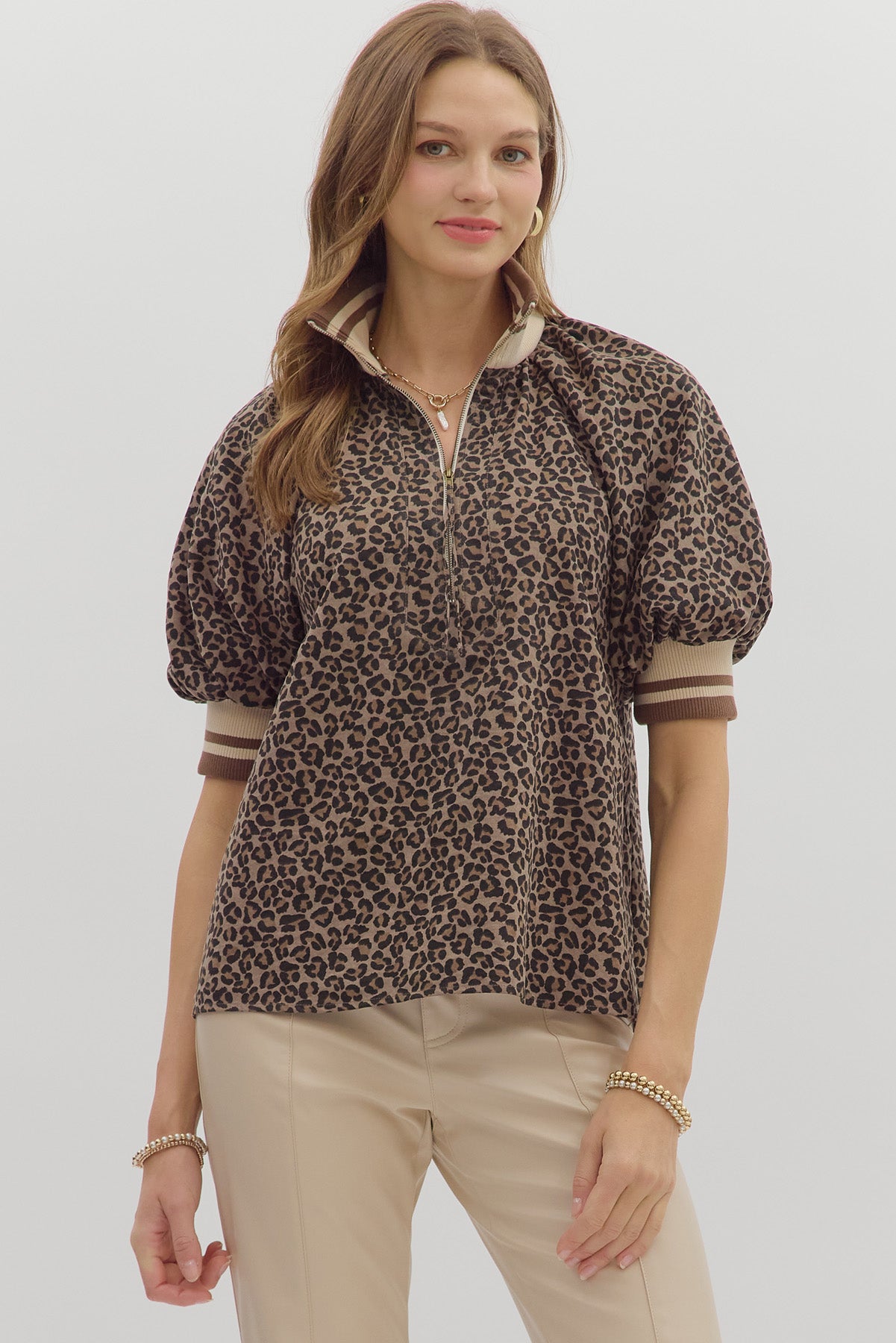 Leopard Mocha Zip Top with mocha and leopard print, half zip closure, and relaxed fit.