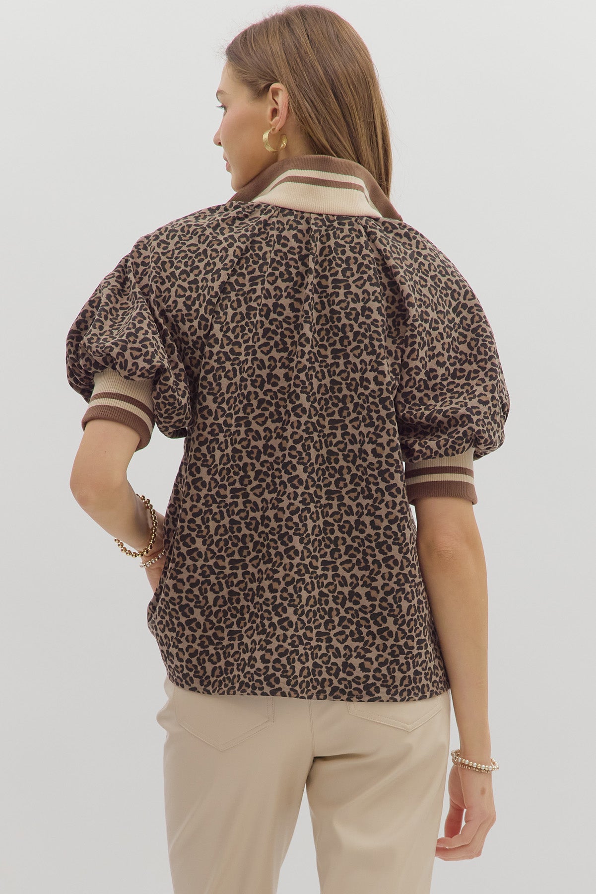 Leopard Mocha Zip Top with mocha and leopard print, half zip closure, and relaxed fit.