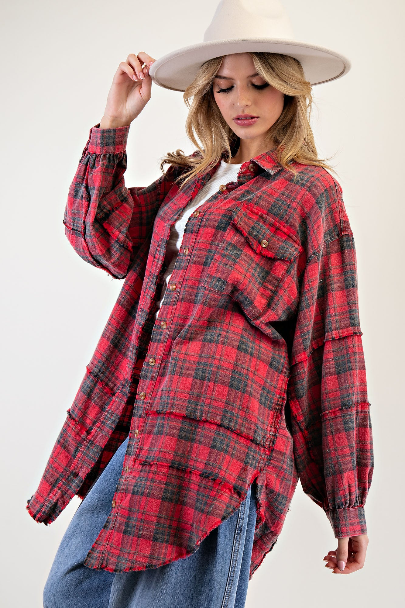 Red mineral washed plaid flannel shirt with button-down front, frayed hem, and chest patch pocket — Red Plaid Flannel Shirt from Frost Impressions Boutique.
