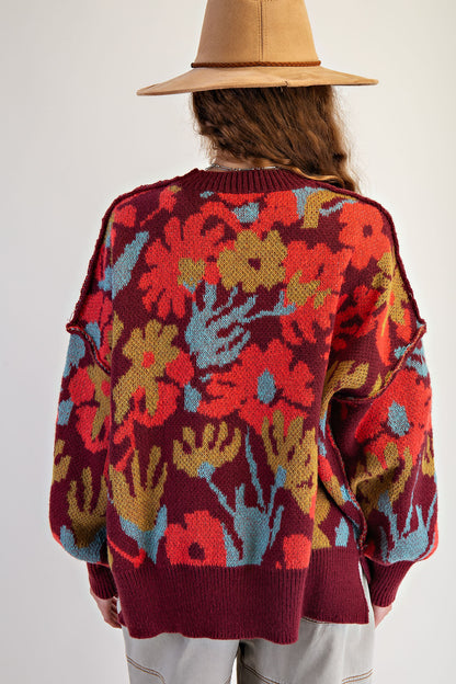 Burgundy floral patterned oversized sweater pullover with crew neckline and side slits — Bloom Haven Floral Sweater (Burgundy) from Frost Impressions Boutique.