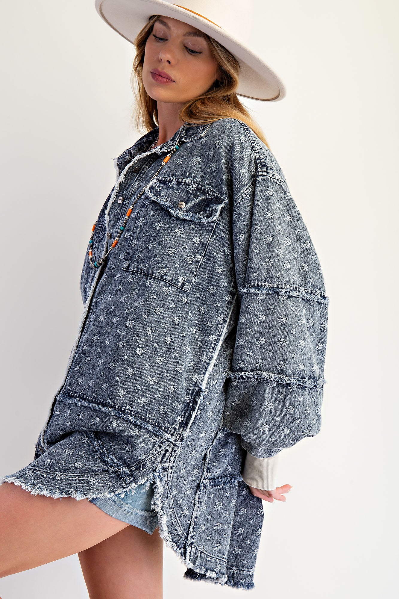 Textured washed denim oversized button down tunic top with mini floral embroidery and raw edge trim — Dolly Denim Tunic Top from Frost Impressions Boutique.