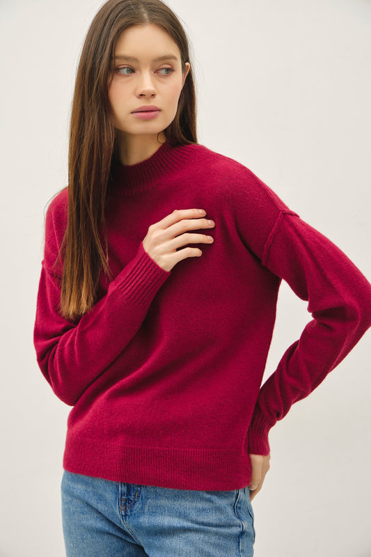 Poppy red mock neck cropped pullover sweater with raised seam detailing and drop shoulders — Poppy Lane Highneck Sweater from Frost Impressions Boutique.