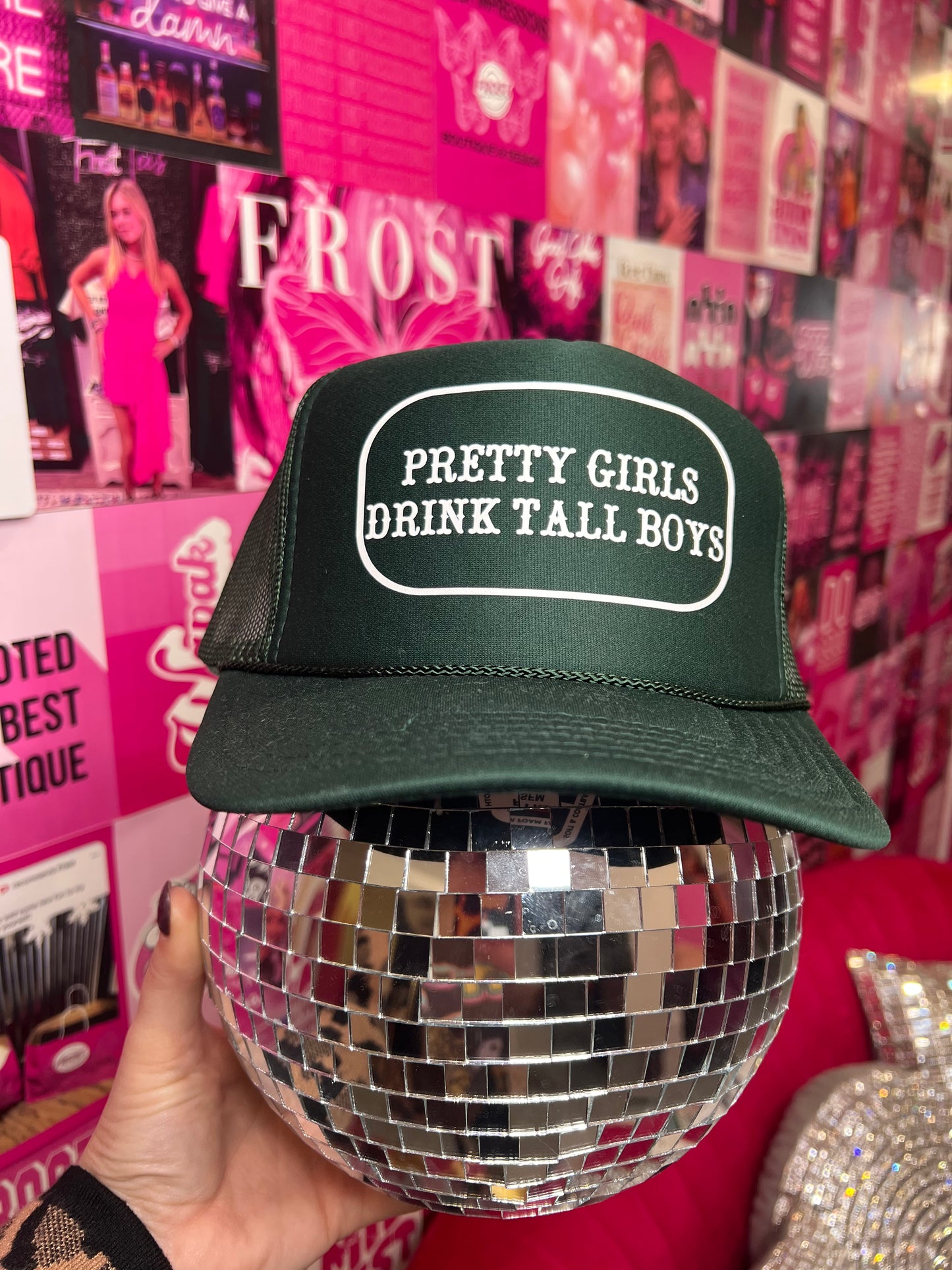 Foam Otto trucker hat in deep green, black, and dark brown with “Pretty Girls Drink Tall Boys” embroidered design — trendy boutique hat from Frost Impressions Boutique in Wapakoneta, Ohio.