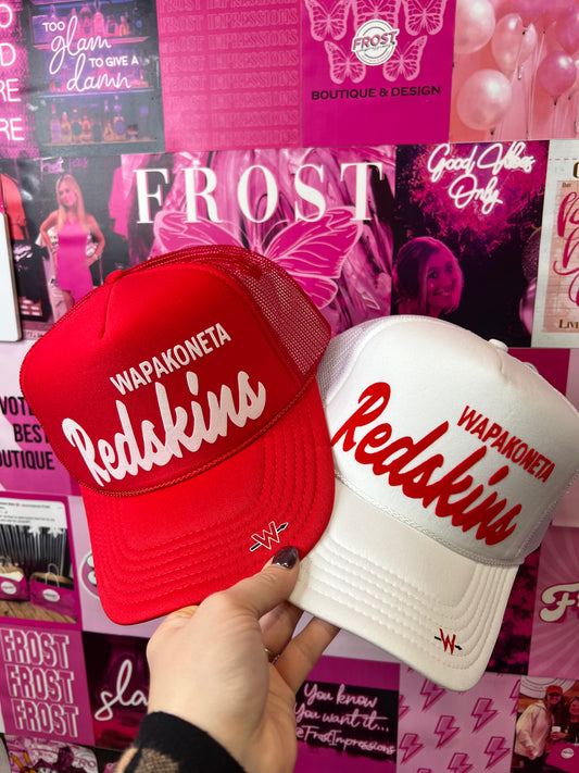 Wapakoneta Redskins “W” trucker hat in white and red color options — breathable mesh back and embroidered varsity “W” design from Frost Impressions Boutique in Wapakoneta, Ohio.