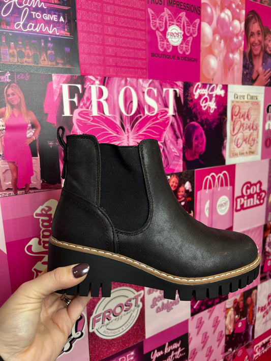Black slip-on platform ankle bootie — Pasadena Bootie (Black) from Frost Impressions Boutique in Wapakoneta, Ohio.