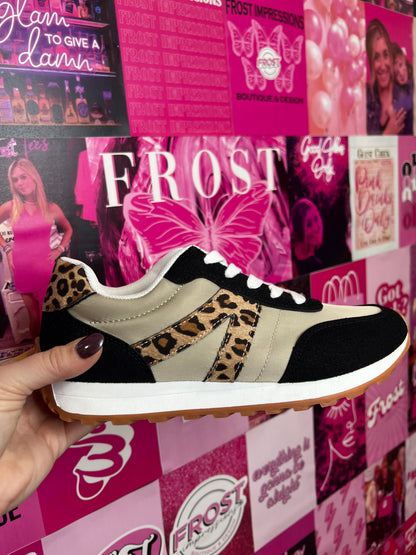 Very G Joel Black Leopard Sneaker — slip-on women’s sneaker with braided buckle detail, frayed edges, and textured beige sole from Frost Impressions Boutique in Wapakoneta, Ohio.