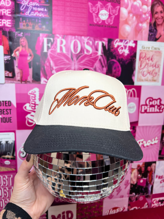 Cream and black trucker hat with bronze “Mom Club” patch — trendy boutique hat for moms.