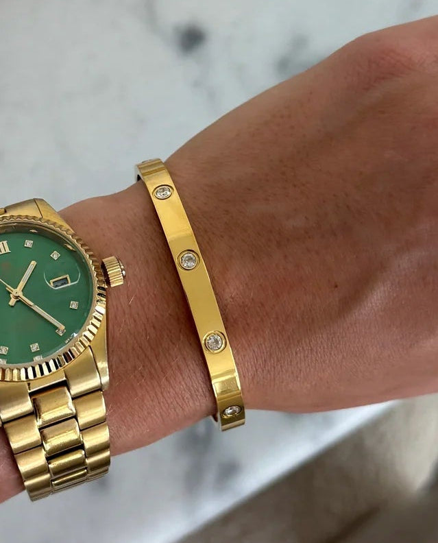 Luxe Bangle — 18k gold plated stainless steel water-resistant bracelet with lifetime warranty, available at Frost Impressions Boutique in Wapakoneta, Ohio.