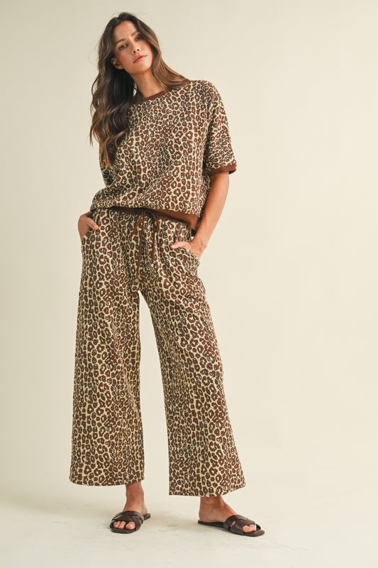 Luxe Leopard Lounge Set — leopard jacquard textured knit top with contrast band and cropped wide leg pants with drawstring waistband.