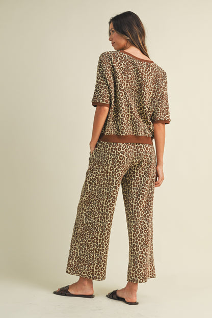 Luxe Leopard Lounge Set — leopard jacquard textured knit top with contrast band and cropped wide leg pants with drawstring waistband.