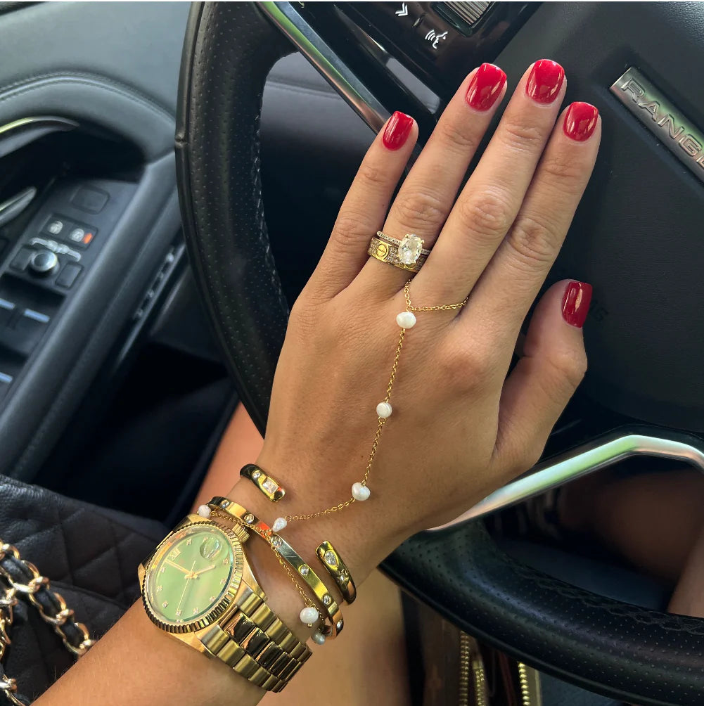 Pearl Hand Chain — 18k gold plated stainless steel hand bracelet with pearl accents, available at Frost Impressions Boutique in Wapakoneta, Ohio.