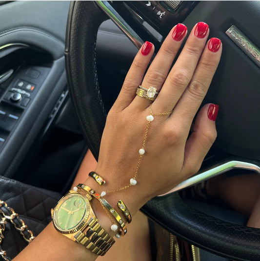 Pearl Hand Chain — 18k gold plated stainless steel hand bracelet with pearl accents, available at Frost Impressions Boutique in Wapakoneta, Ohio.