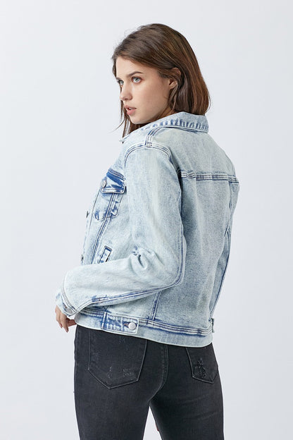 Vintage washed denim jacket with relaxed fit, classic button front, and subtle stretch fabric