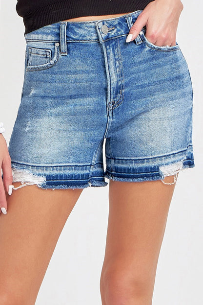 High rise denim shorts with released distress hem, raw edge detailing, and flattering fitted waist