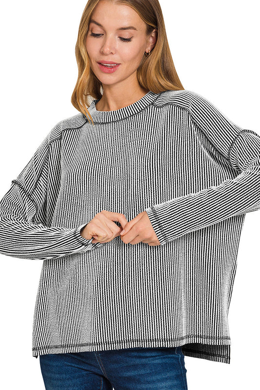 Black and white ribbed boat neck long sleeve top with raw edge finish — Contrast Ribbed Top from Frost Impressions Boutique.