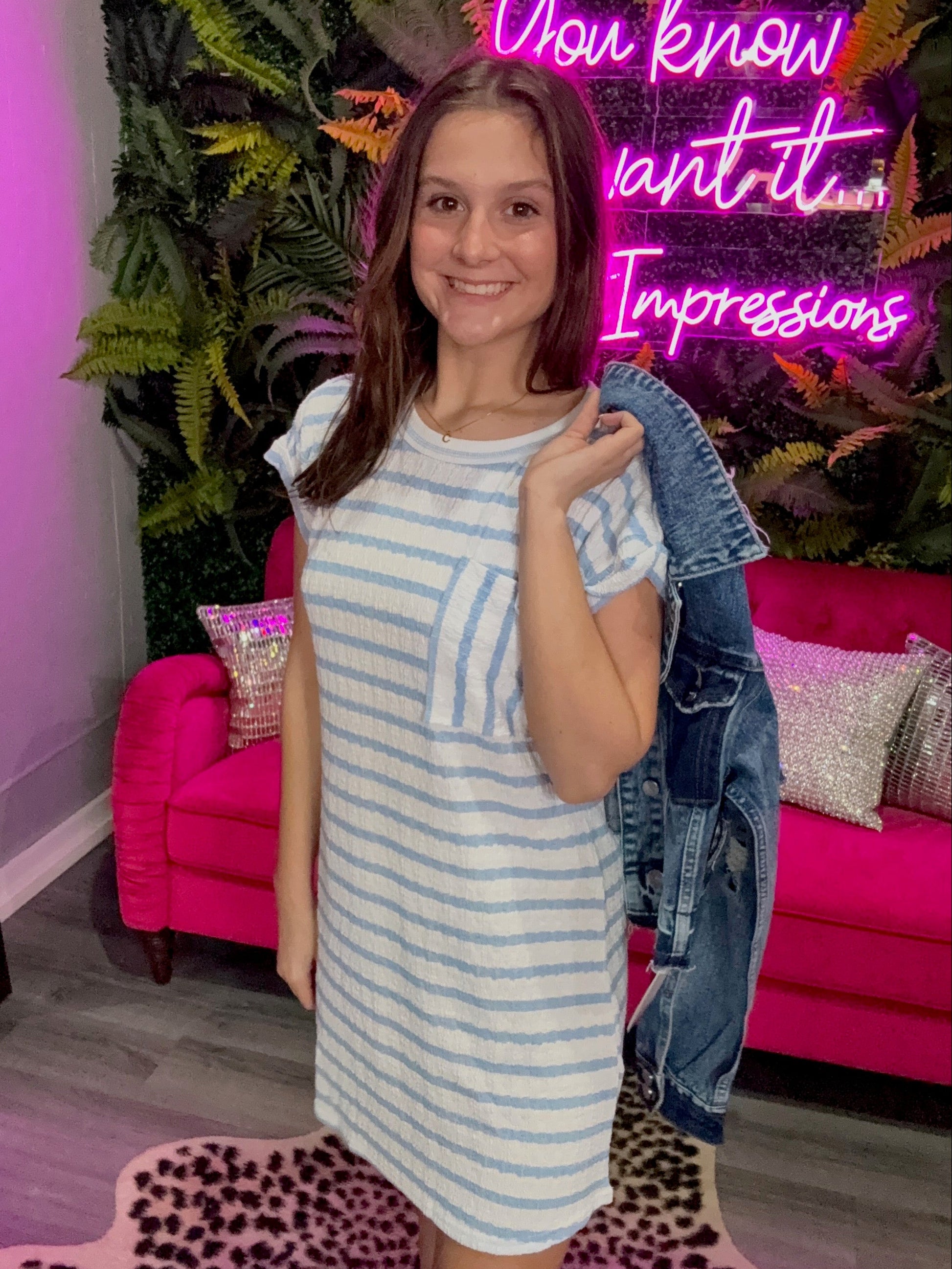 Textured stripe knit t-shirt mini dress with cuffed sleeves, pocket detail, and relaxed fit