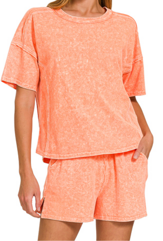 Acid wash lounge set with short sleeve tee and elastic waistband shorts in pink, mango, and violet color mixes