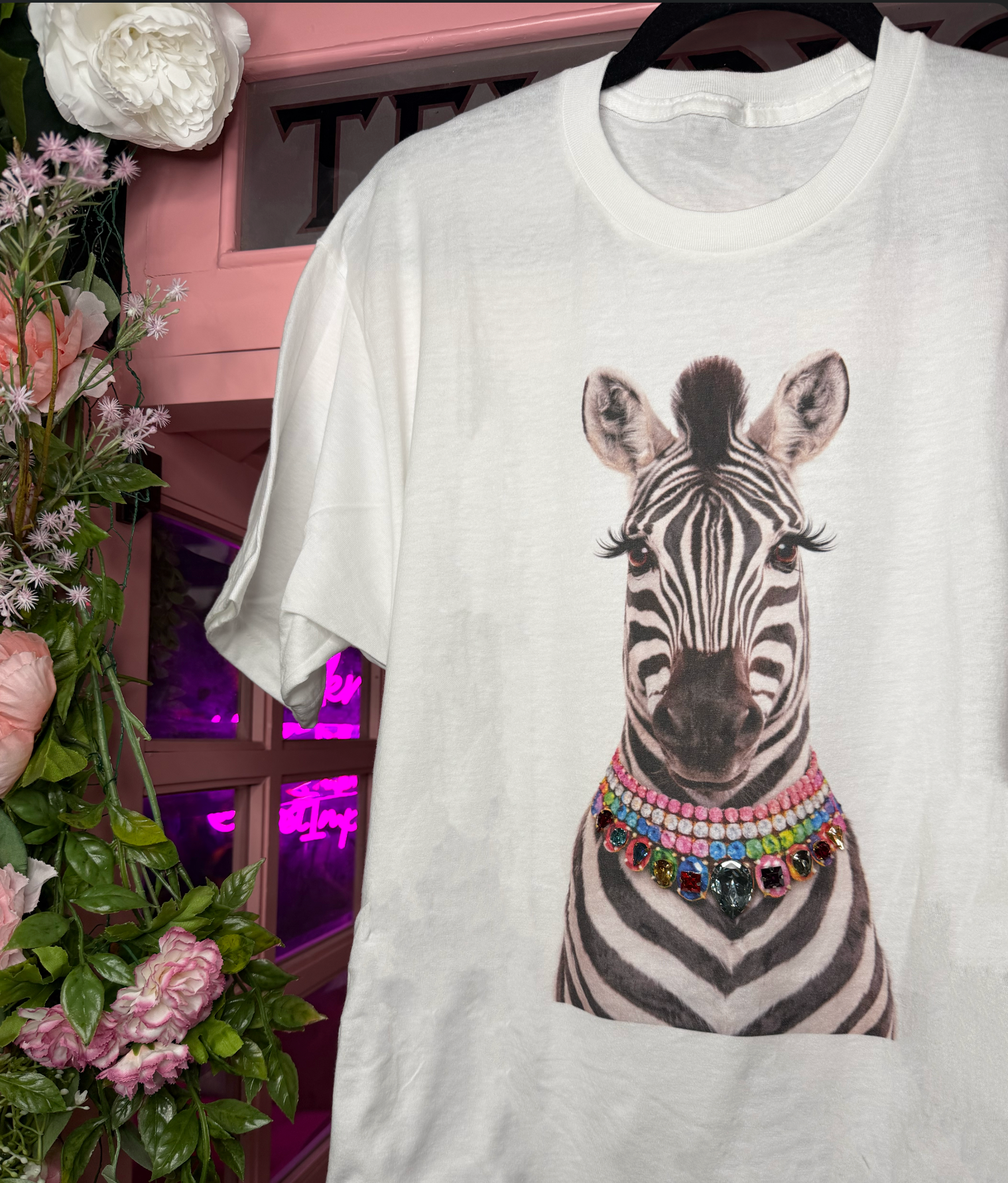 Soft graphic tee with colorful rhinestone zebra design in a relaxed fit