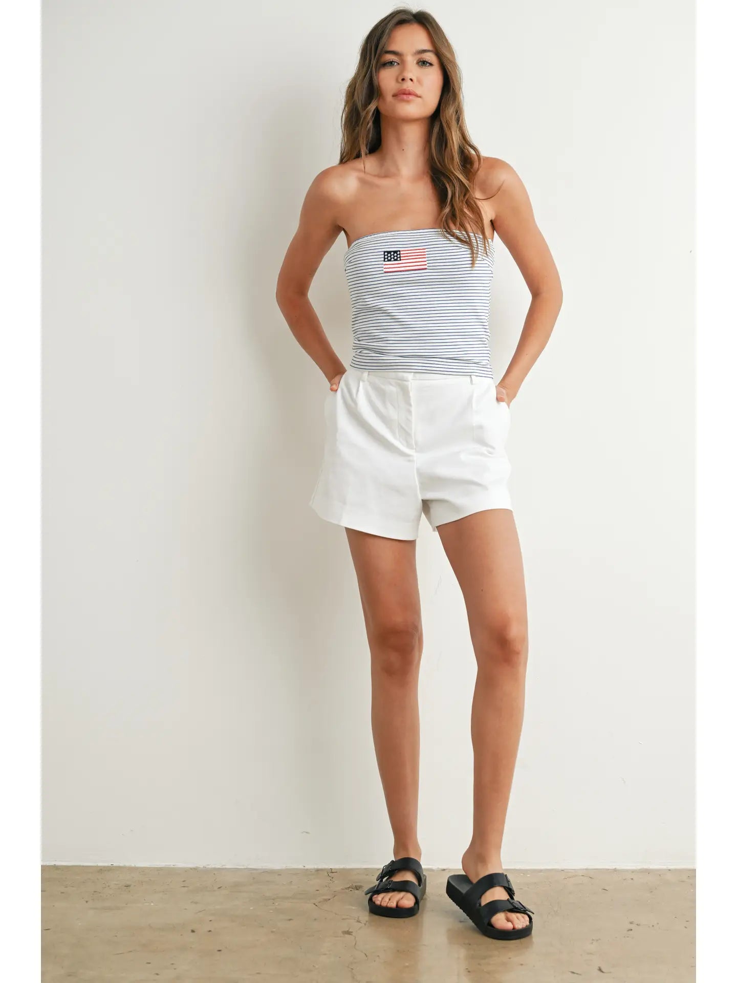 Navy striped strapless tube top with embroidered American flag detail and stretchy fit