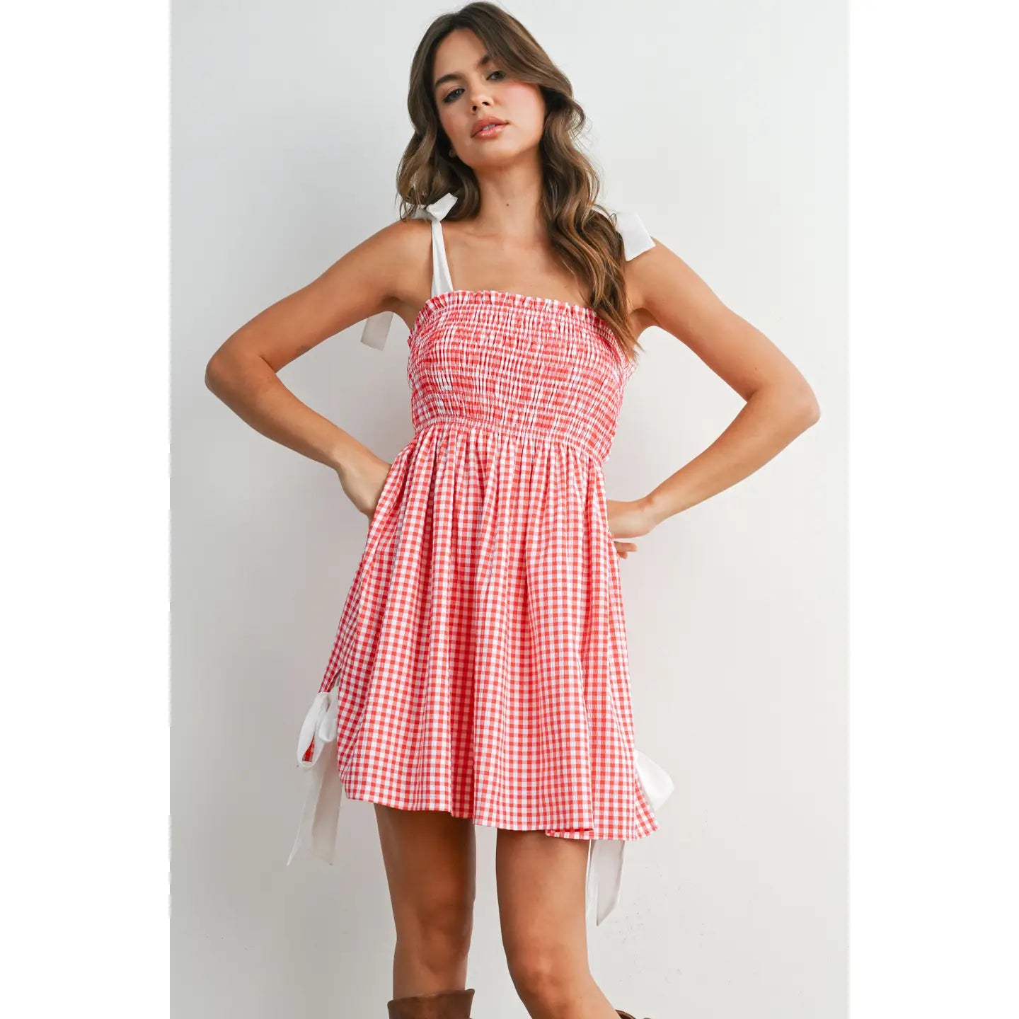 Strapless gingham mini sundress with shirred smocked bodice and flowy skirt
