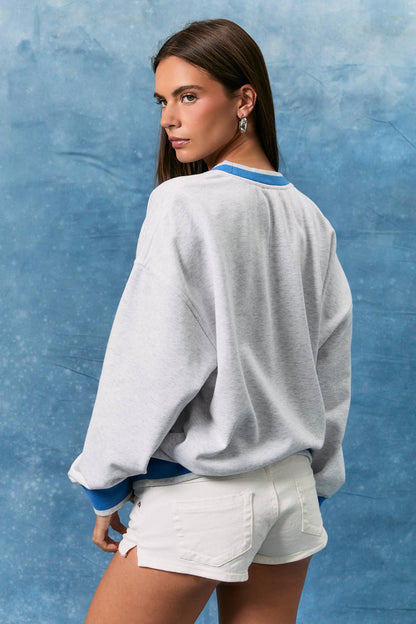 Vintage grey oversized crewneck sweatshirt with bold UNITED STATES graphic and relaxed fit