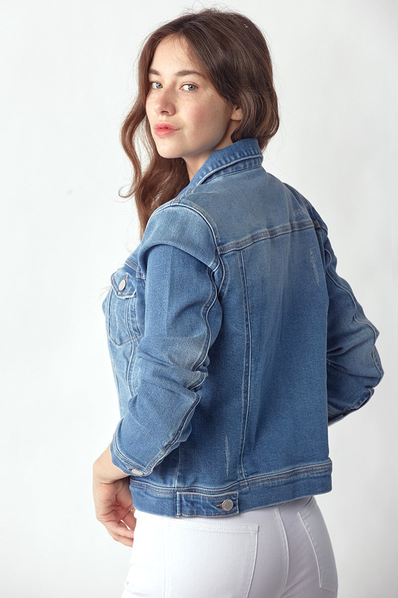 Vintage washed denim jacket with classic button front, soft denim fabric, and timeless fit