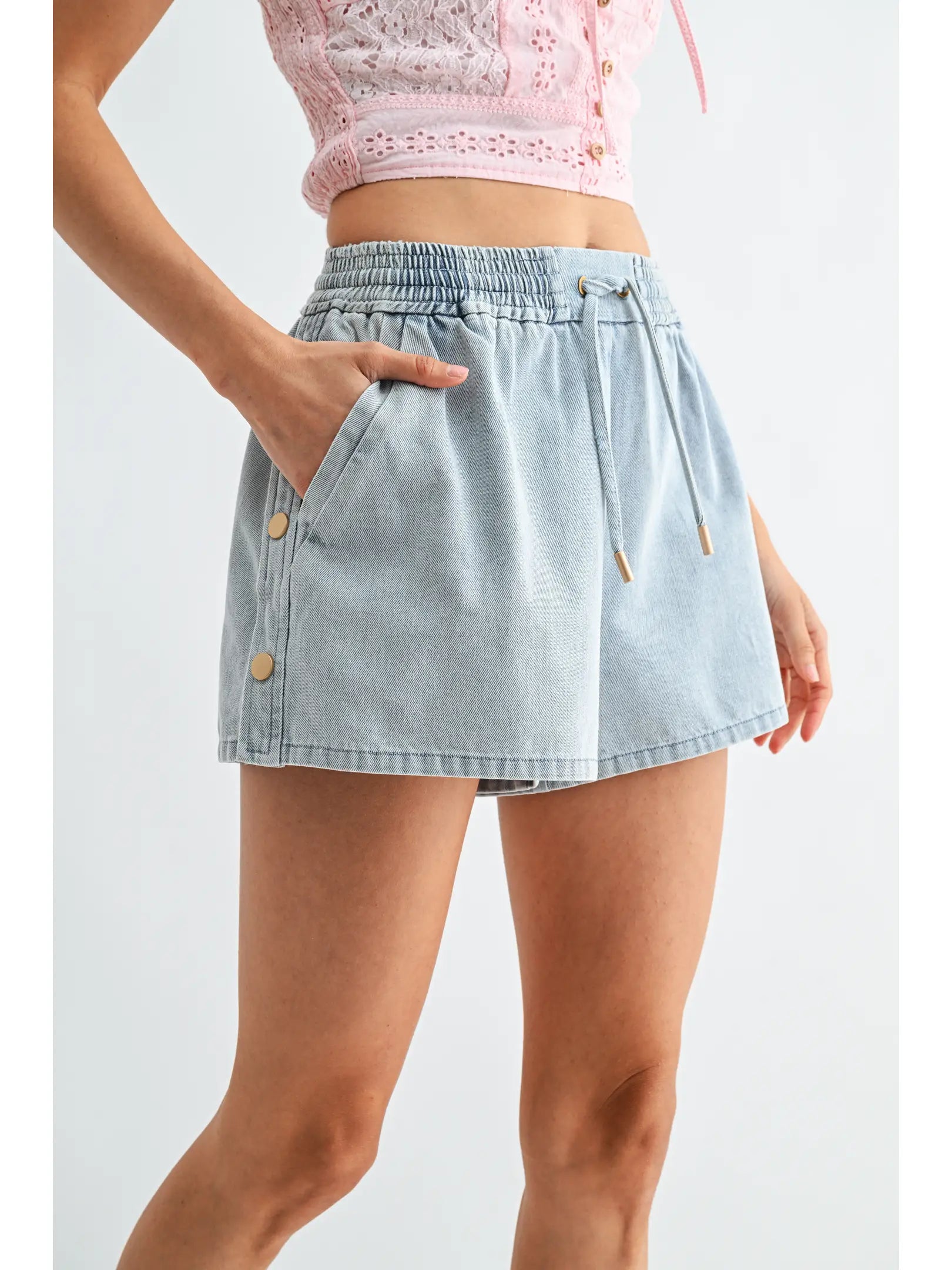 Washed denim drawstring shorts with side button detail and relaxed fit